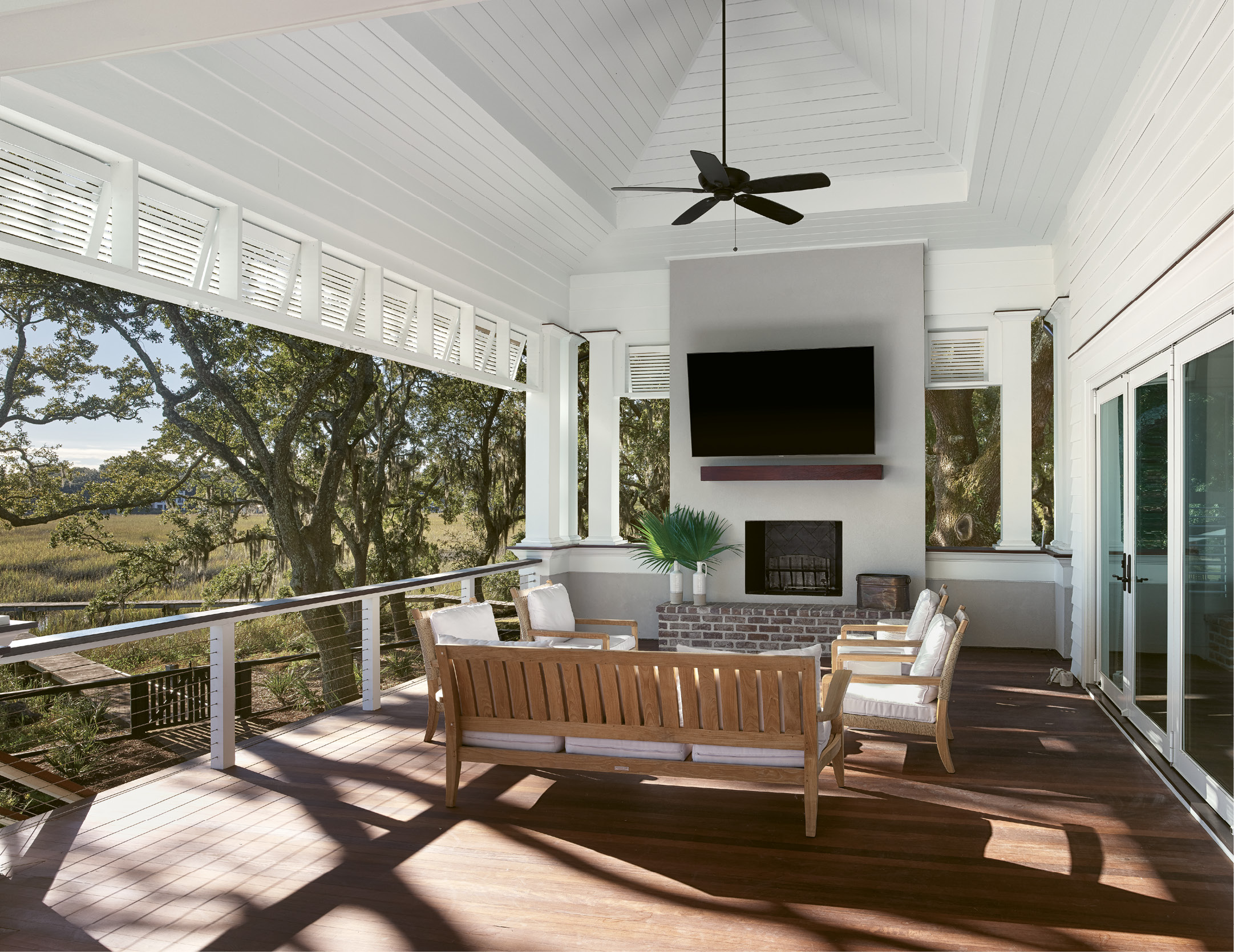 The upstairs living area is a quieter place for family and friends to gather for sunsets or to watch the big game.